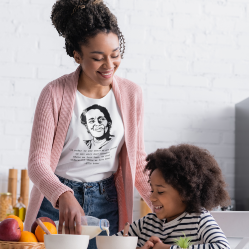 Ella Baker In Order to See women's basic Relaxed fit t-shirt lifestyle Ella Baker In Order to See women's basic Relaxed fit t-shirt worn in a lifestyle photo